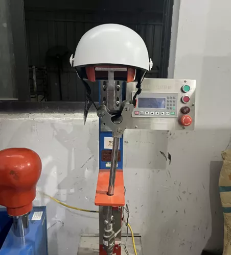 Impact resistance testing for motorcycle helmets in the quality lab